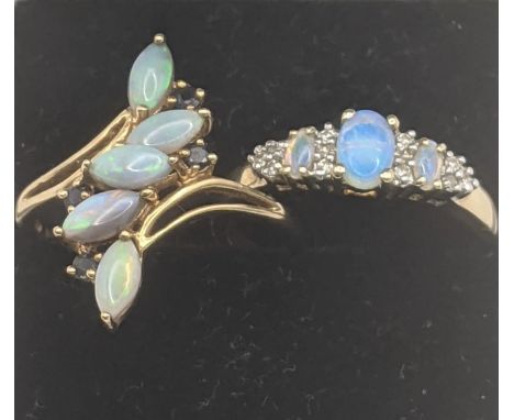 Two 9ct yellow gold ladies rings to include one example set with three moonstones in four claw setting and diamonds together 