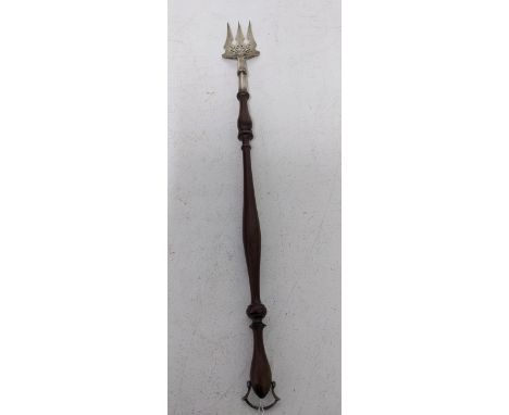 An Edward VII silver and turned wood toasting fork, the handle terminating with a silver hanging loop, Sheffield 1909, maker'