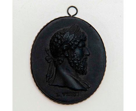 Black basalt oval portrait medallion modeled in a relief of Lucius Verus, a Roman Emperor, in a metal tone pendant.L Verus im