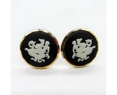 Decorated with images of St. George and the dragon in high relief, with metal backing.This item has its original box with dim