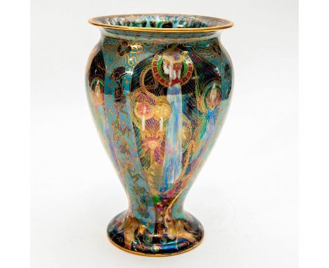 Inside, Light blue lustre with Flaming Wheel border along the inside of the rim of the vase. Outside, Large white candles sha