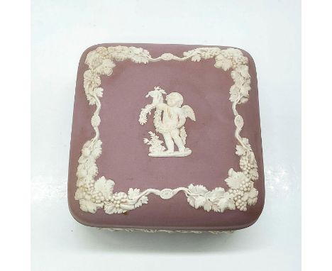 Lidded trinket box in lilac ground with sprigged Neoclassical Cupid Summer pattern in white relief.Wedgwood backstamp. Issued