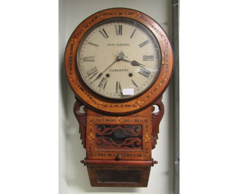 A hanging wall clock by Thos Davies, oswestry quarterly Westminster chime, the face with Roman numerals and the case of wood 