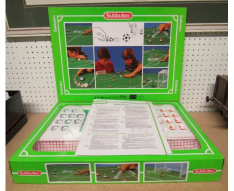 Subbuteo set, two sides red and blue, complete and in virtually mint condition.