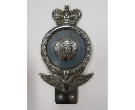 An RAC badge with queens crown, faded blue surround to centre.