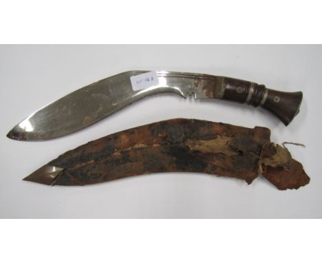 A Kukri with Scabbard blade with chromed finish, some minor rust, scabbard poor.