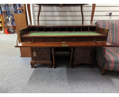 Mahogany kneehole secretaire with brass drop handles L123 x D60 x H83cmSome wear and light scratches 