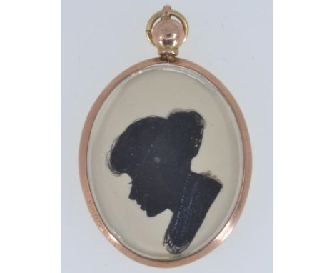 9ct gold double sided silhouette portrait pendant with a young lady on one side and a gentleman verso, length including bale 