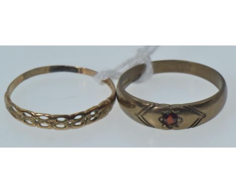 Two 9ct gold band rings, including one set with a red stone & the other of open work design, size R & S1/2 respectively, gros