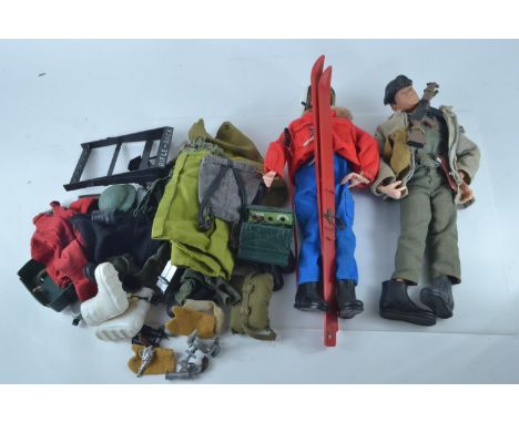 Two vintage action men, one with painted hair and the other with blonde flocked hair, with accessories inc. clothes and vario