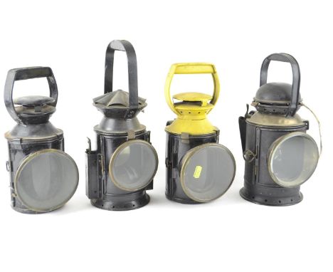 Four vintage railway oil lamps, one made by G.Polkey Birminghammissing wicks. 