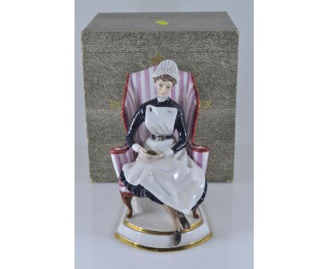 Royal Worcester model of 'Sister, Nightingale Training School St. Thomas' Hospital (London)', modelled by Ruth Van Ruyckevelt