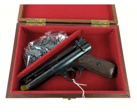 Vintage Webley Senior .22 over lever action air pistol, 1286 stamped to front of pistol, with wooden box with a small amount 