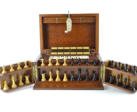 Mahogany lockable cased games compendium, including dominoes, chess, cards, drafts, Royal basique, counters and others, 33.5c