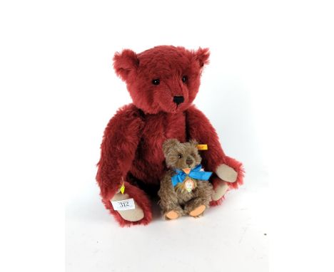 A Steiff Burgundy 40 jointed bear with growler. No. 00693 & a small Steiff Zotty 1960 bear with tag. 