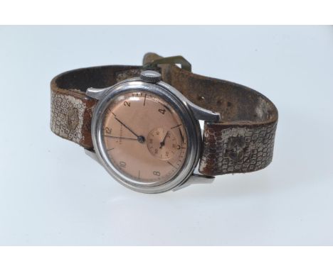 Vintage 1942 Longines Acier Inox stainless steel cased watch, with subsidiary seconds, copper coloured face, marked to rear o