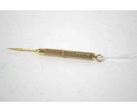 9ct gold engine turned propelling tooth pick, hallmarked Birmingham 2000, 6.33 grams 