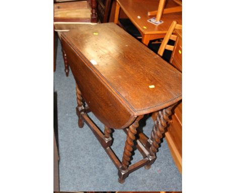 AN OAK BARLEY TWIST TABLE TOGETHER WITH OAK COMMODE