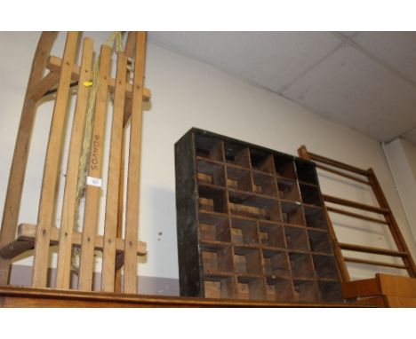 A WOODEN SLED AND A SET OF PIGEON HOLES A/F AND A BAMBOO TOWEL RAIL (3)