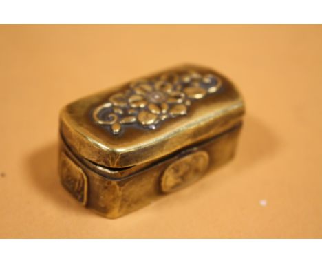 AN ANTIQUE BRASS PATCH BOX