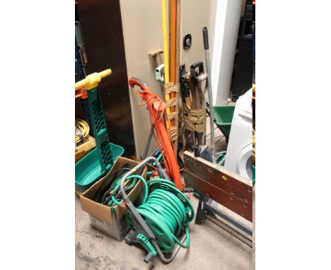A LARGE QUANTITY OF GARDENING TOOLS TO INCLUDE A PRESSURE WASHER, STRIMMER, WORKBENCH ETC