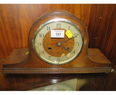 A VINTAGE OAK NAPOLEON HAT MANTLE CLOCK 