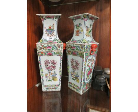 A PAIR OF ORIENTAL CERAMIC TWIN HANDLED FAMILLE ROSE VASES WITH FOUR CHARACTER BACK STAMP, H 45 CM