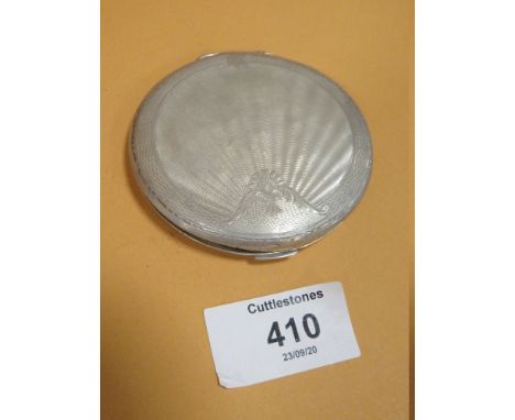 A HALLMARKED SILVER CIRCULAR COMPACT