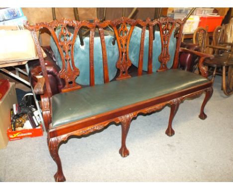 A MODERN CHIPPENDALE STYLE CARVED THREE SEATER BENCH / SOFA - W 164 CM