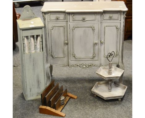 A shabby chic breakfront side cabinet three short drawers over three cupboards; a French bread box; a three tier wall shelf; 