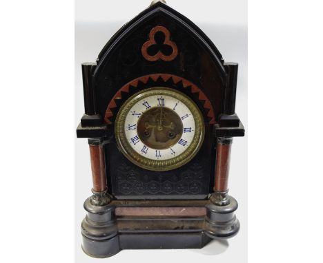 A Gothic revival Belge Noire mantel clock, open escapement, enamelled dial, Roman numerals, gilt metal bezel, twin winding ho