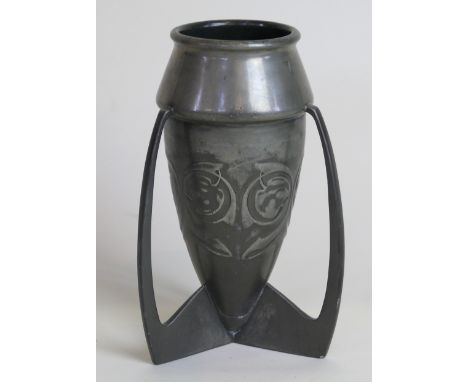 An Arts & Crafts Tudric Pewter 'Bomb' vaseDesigned by Archibald Knox and produced for Liberty & Co, relief decorated depictin