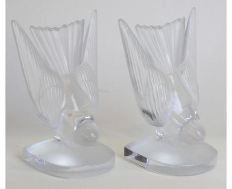 A pair of Lalique France frosted and clear glass bookends'Hirondelle' signed to base, height 16cm. CONDITION REPORT: Modern i