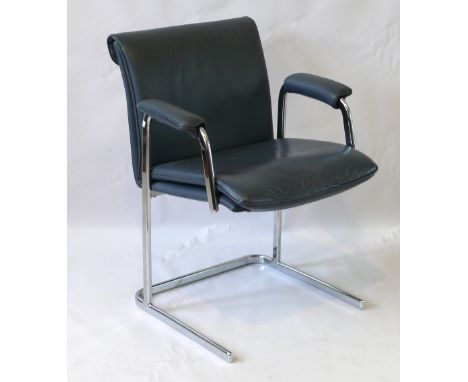 A stylish chrome framed armchairCirca 1970's, upholstered in a light grey leather material, height 80cm.