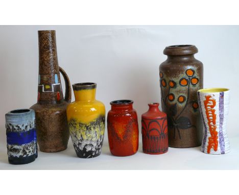 Seven West German 'Fat Lava' ceramic vasesTo include a Scheurich cylindrical vase, relief decorated with stylised foliated wi