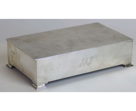 An Art Deco style hallmarked silver rectangular cigarette boxThe cover having engine turned decoration, made by Fergenbaum & 