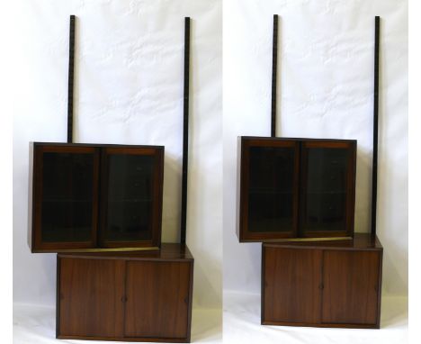 A pair of excellent quality Danish Cado rosewood ladder shelf unitsHaving ladder style wall brackets, each bookcase having on