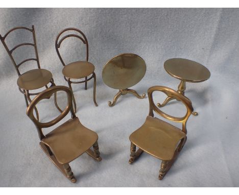 A COLLECTION OF MINIATURE BRASS FURNITURE including two tripod tables