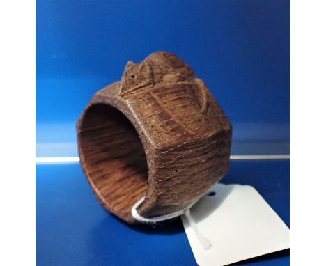 ROBERT THOMPSON OF KILBURN: 'MOUSEMAN' an octagonal oak napkin ring