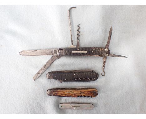 A VICTORIAN PENKNIFE an ancestor of the Swiss Army knife, with two similar ones, and a fruit knife