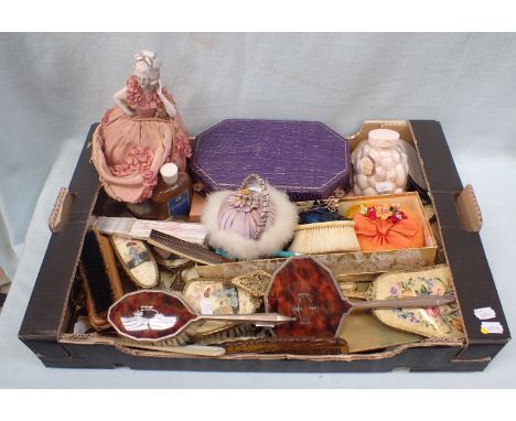 A 1920S CERAMIC HALF-DOLL ON SILK BODY vintage powder puffs, dressing table items and sundries