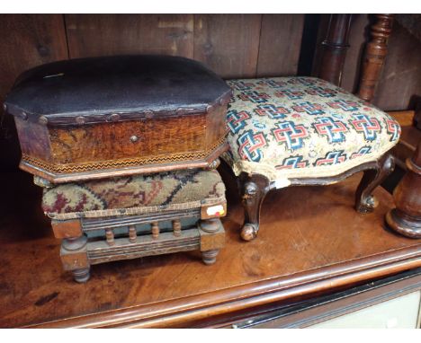 A VICTORIAN WALNUT FOOTSTOOL with parquetry banding, on ceramic lobed bun feet, 31cm wide, and two further footstools (3). Pr