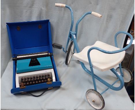 A CHILD'S VINTAGE TRICYCLE and a junior typewriter