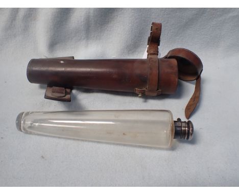 A LEATHER-CASED GLASS HUNTING FLASK 25 cm long