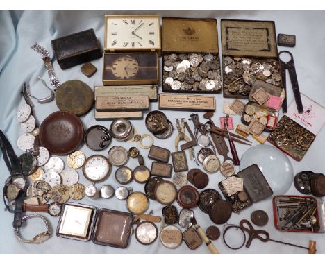 A COLLECTION OF WATCHMAKER'S PARTS TOOLS and spare movements