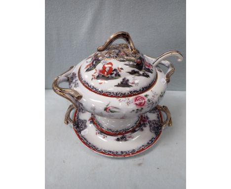 A LARGE VICTORIAN TUREEN with ladle