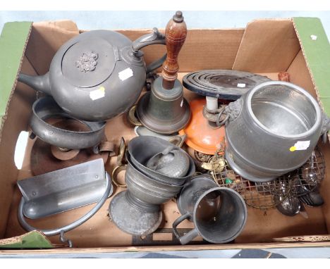 A COLLECTION OF PEWTER AND METALWARE to include a teapot and a hand bell (a lot). Provenance: The Estate of the Late Rufus Ey