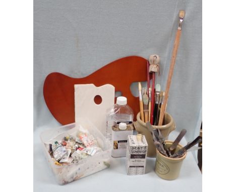 A COLLECTION OF ARTISTS' OIL PAINTING MATERIALS including paints, various brushes (some unused), Mahl stick, palette, palette