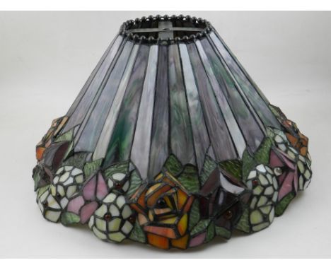 A Tiffany style stained glass lamp shade. 