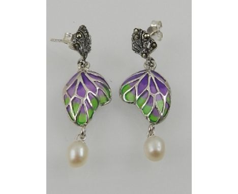 A pair of white metal, enamel, marcasite, and pearl drop earrings.
